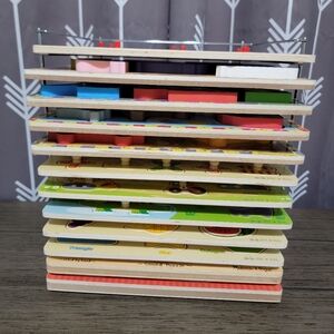 Melissa and Doug puzzle rack and 12 puzzle